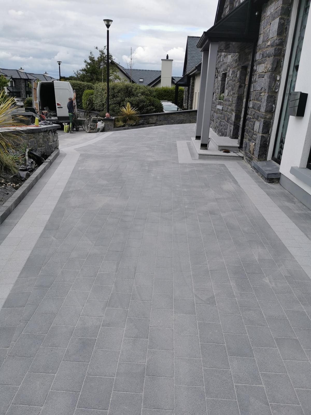 Freshly laid driveway running up to a house